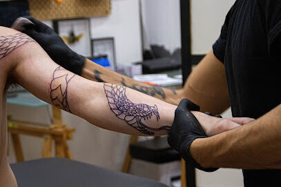 Maison Python Tatouage