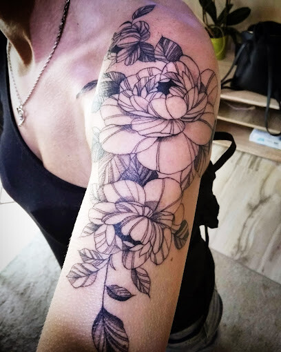 Rising Moon Tattoo & Art