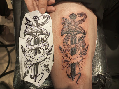 NEEDLE ARTS TATTOO STUDIO