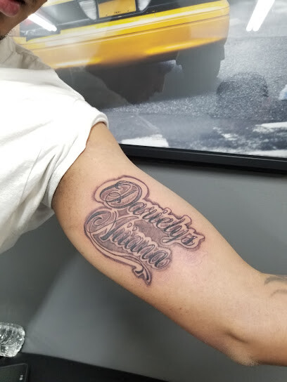 Chucky's Cut Tattoo &
