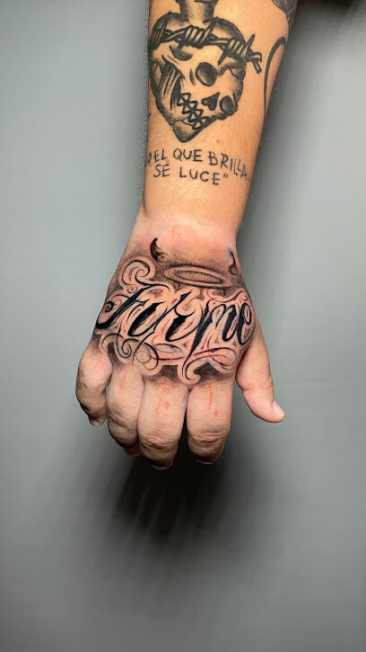 Golden Ink Tattoo and