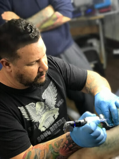 Adrian Tattoo Piercing