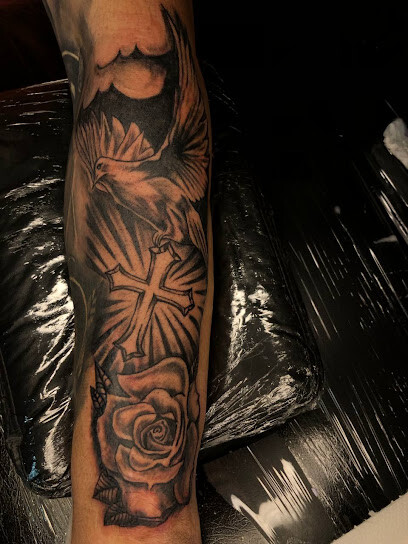 A. M. Tattoo