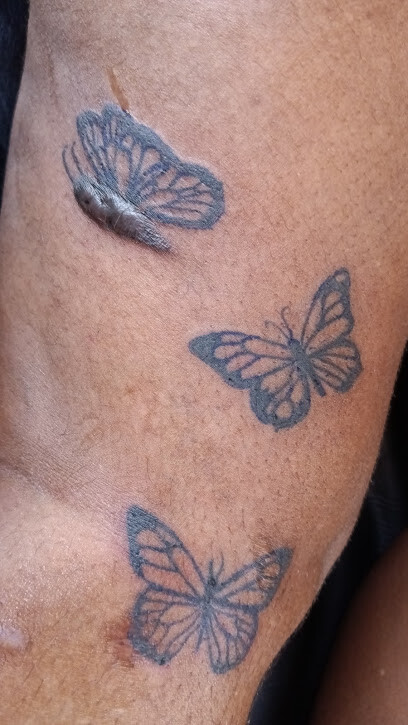 Magic Fingers Tattoo and