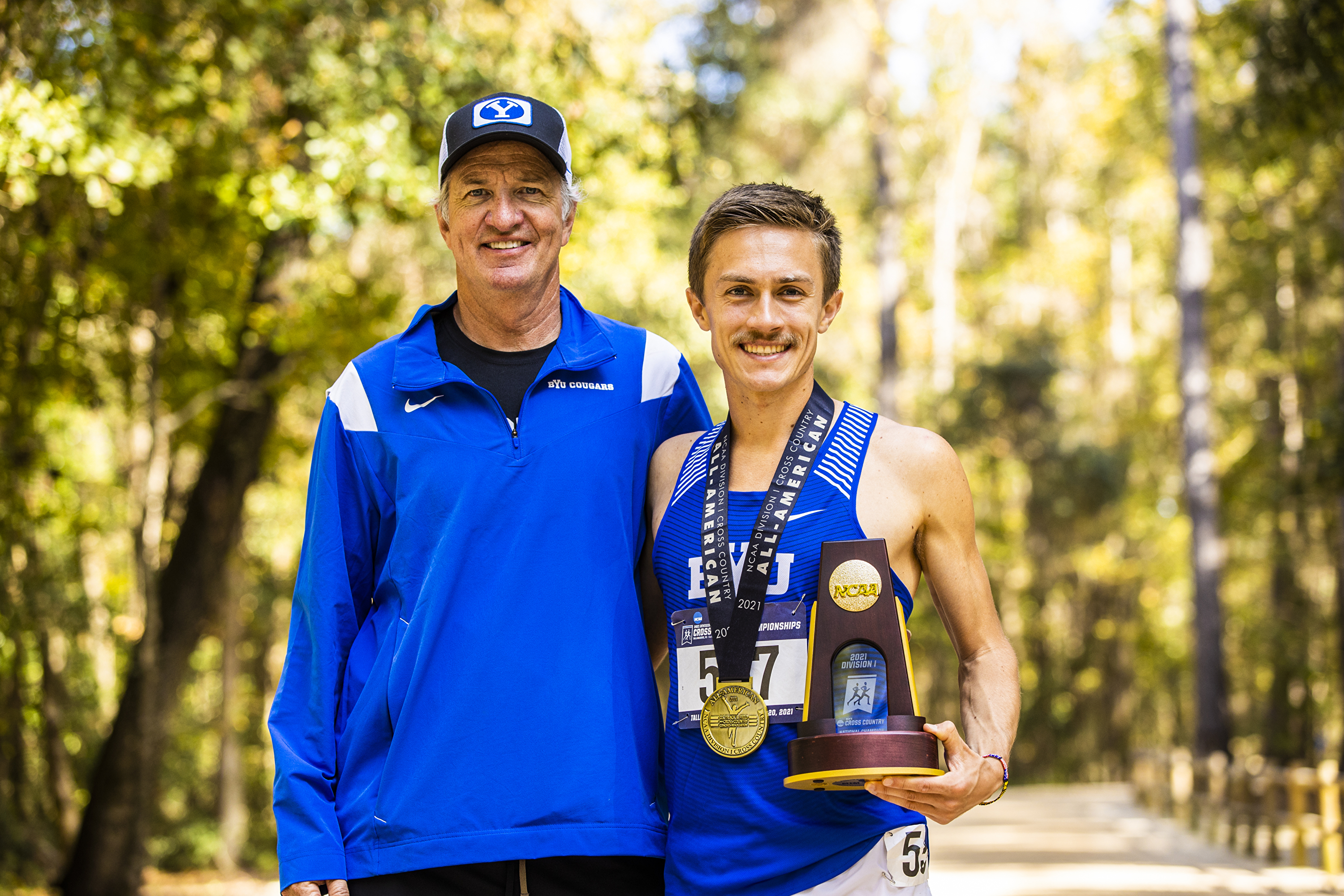 Conner Mantz and head coach Ed Eyestone - NCAA individual champions