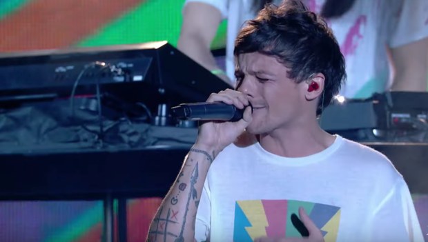 Louis Tomlinson of One Direction performs live during the X Factor Live  tour, at Wembley Arena, London. EDITORS PLEASE NOTE: Editorial use only, no  merchandise, no use after July 10, 2011. Further