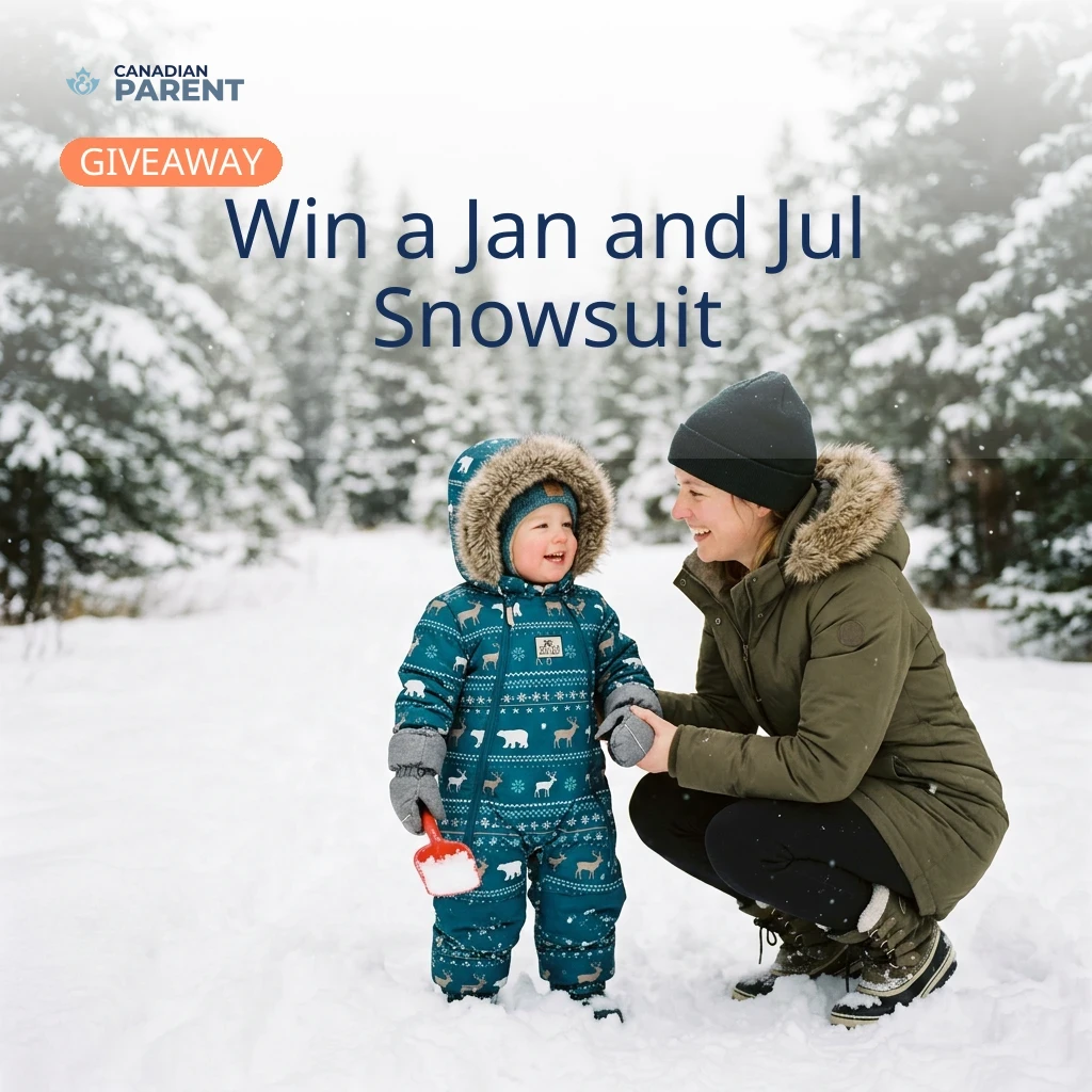 Parent and child enjoying winter outdoors in a Jan and Jul snowsuit.