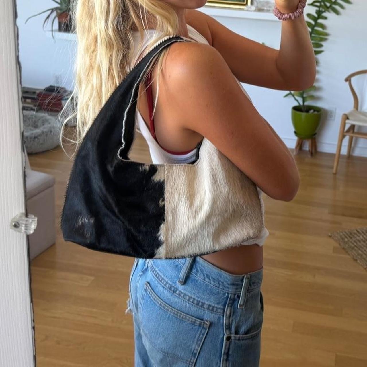 made  Vietnam, cowhide medium size shoulder back!...