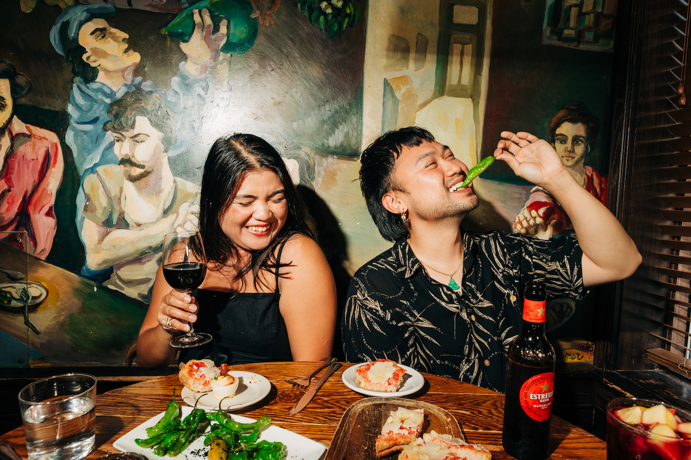 Two guests enjoying happy hour which is available of the fourth of july