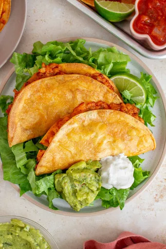 Receta de tacos crujientes de pollo picado al horno