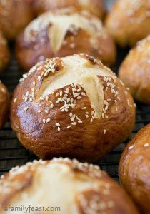 Soft Honey Sesame Pretzel Rolls