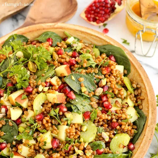 Ensalada de trigo sarraceno y espinacas con vinagreta de naranja y curry
