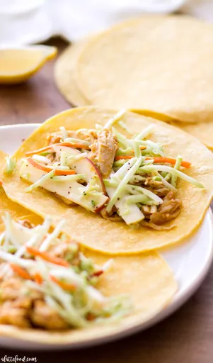 Slow Cooker Pumpkin Butter Chicken Tacos