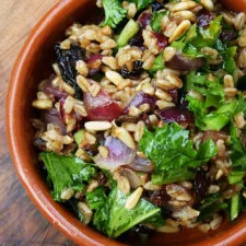 Farro Salad with Roasted Onion, Toasted Pine Nuts, Currants & Greens