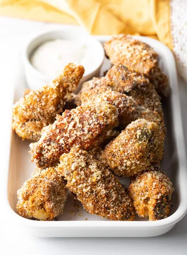 Alitas de pollo con costra de parmesano