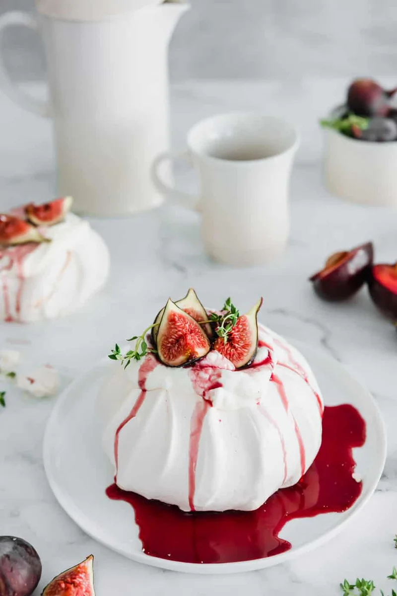 Fig & Thyme Pavlova with Spicy Red Wine Plum Syrup