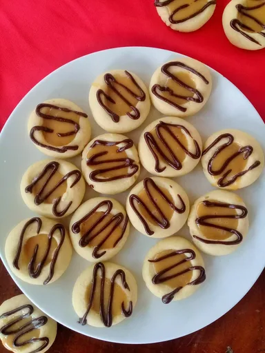 Gooey caramel thumbprint cookies