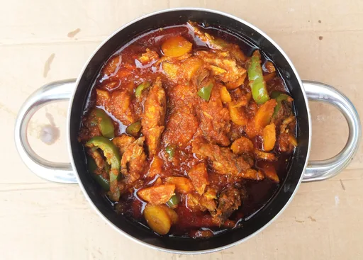 Smoked salmon stew with carrots and bell peppers