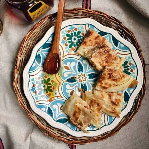 Egyptian Feteer Meshaltet with Almond and Pine Nuts