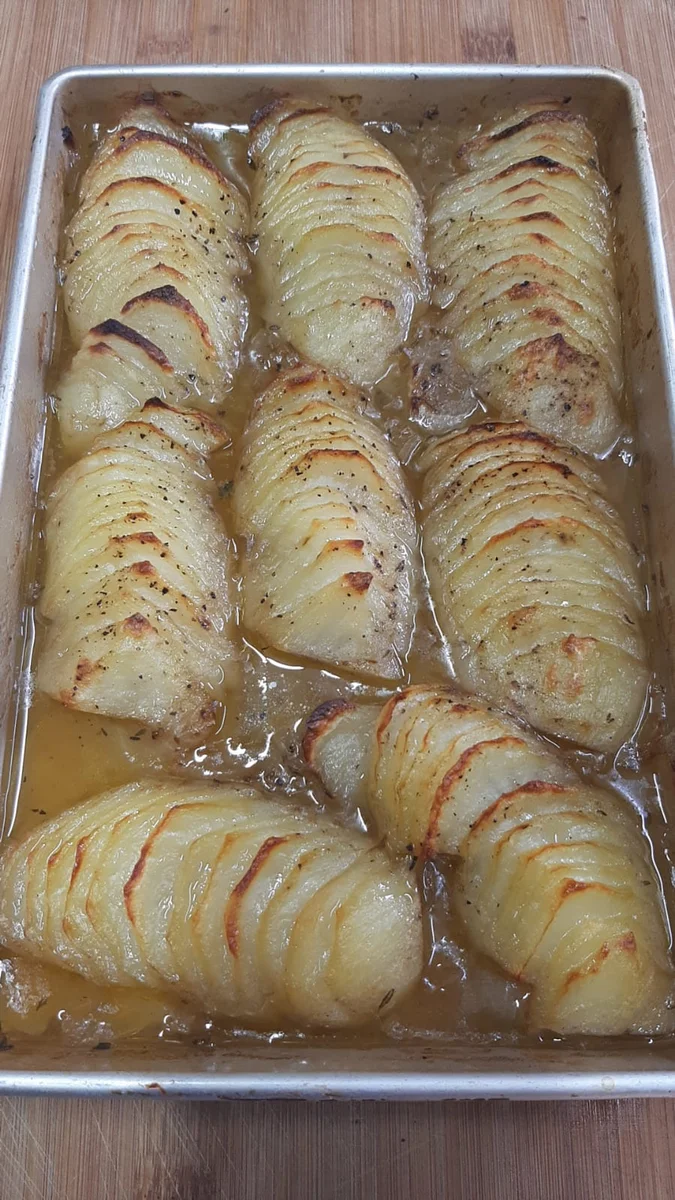 Spiced fanned potatoes and onion