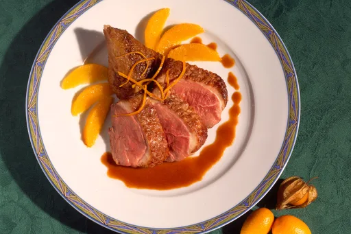 Pato con naranjas