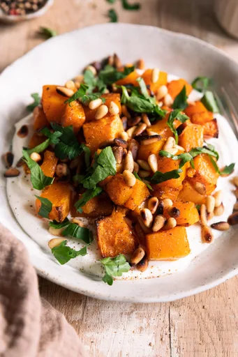 Calabaza butternut asada, ricotta batida y piñones