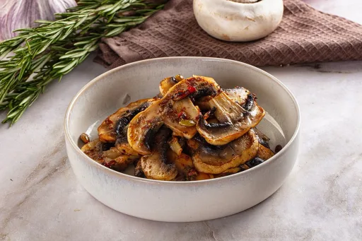 Champiñones al balsámico con ajo y hierbas