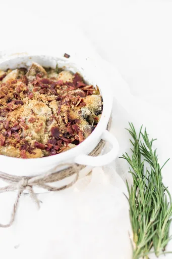 Leek and mushroom casserole with crispy serrano ham