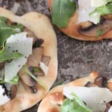Flatbreads with Garlic Mushrooms, Parmesan & Rocket