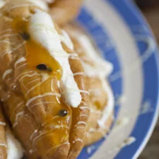 Granadilla Éclairs with White Chocolate Topping