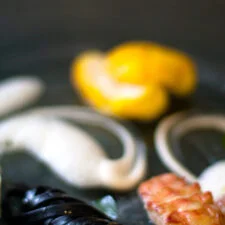 Pan-seared Langoustine, Saffron Monkfish, Squid Ink Tagliatelle