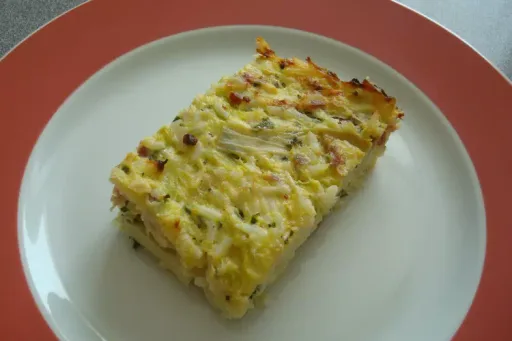Tian de calabacín con panceta ahumada y queso gruyere