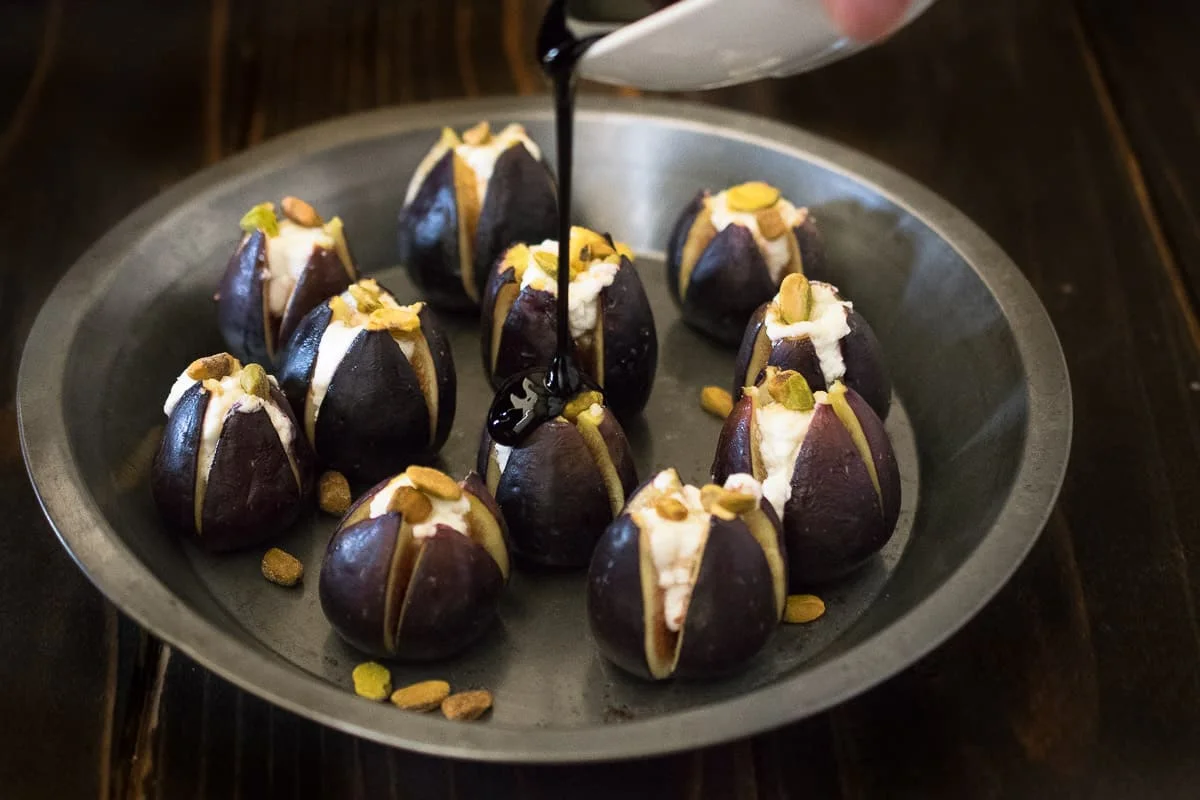 Warm Figs with Goat Cheese, Pistachios and Balsamic Glaze