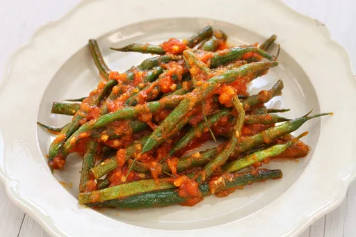 Judías verdes estofadas con confit de ajo y hierbas