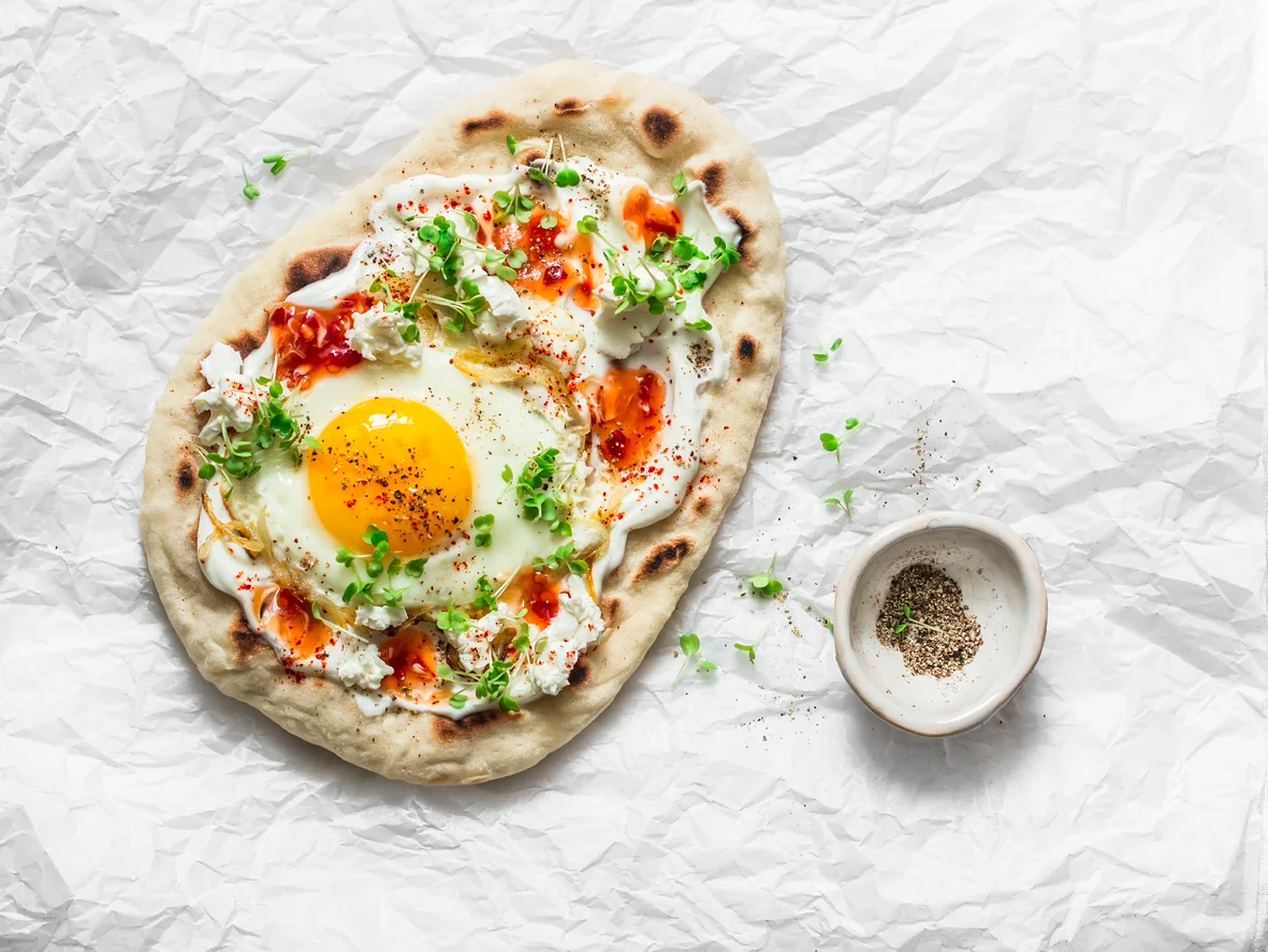 Sunny Side Up Egg Over Spiced Greek Yogurt & Pita Bread