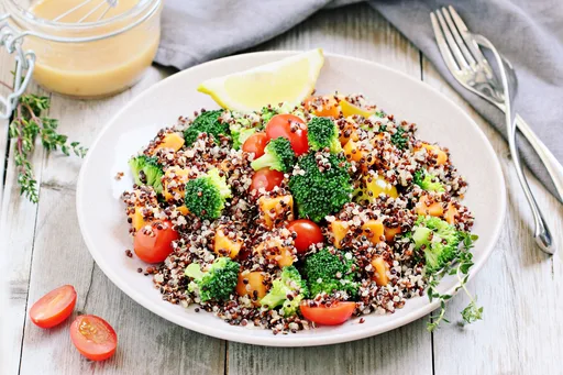 Quinoa Bowl With Broccoli, Tomatoes, Sweet Potatoes & Lemon-yogurt Dressing