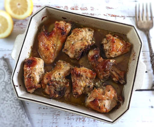 Pollo al horno con limón, miel y romero