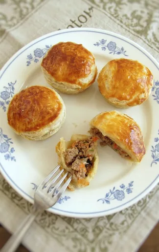 Mini empanadas de carne picada de ternera y cerdo