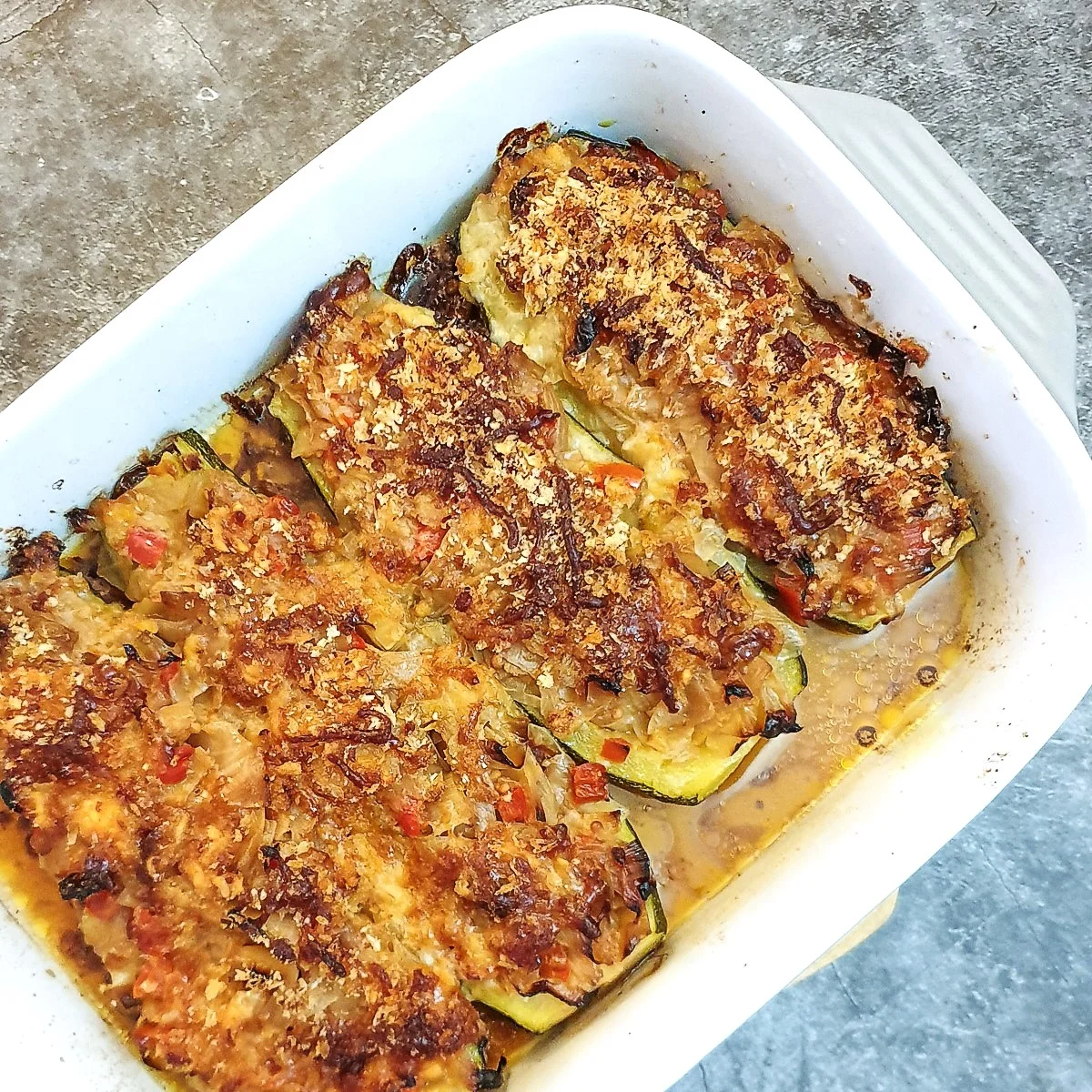 Cabbage-stuffed courgettes