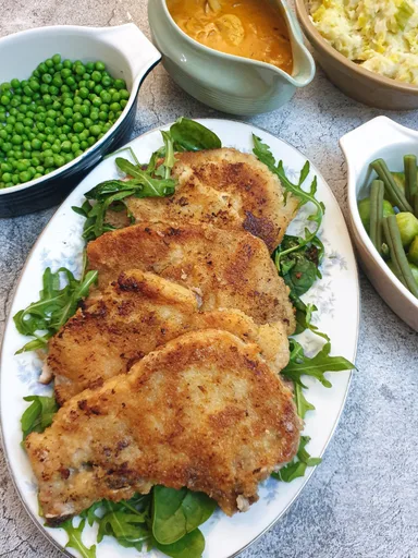 Chuletas de cerdo con costra de parmesano