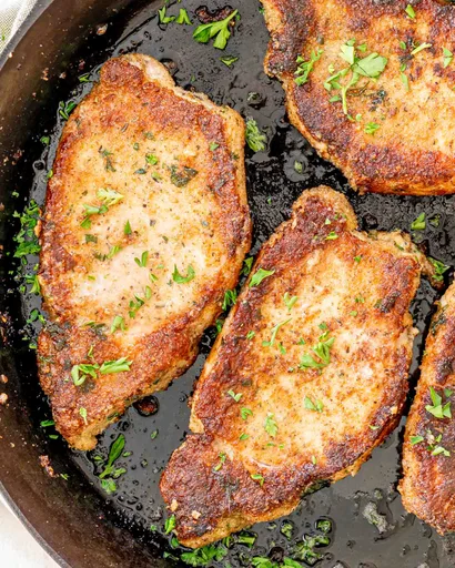 Chuletas de cerdo empanadas a la italiana