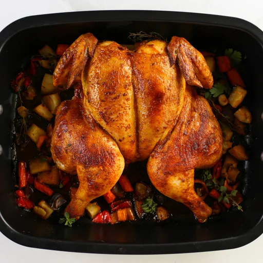 Pollo entero abierto en mariposa