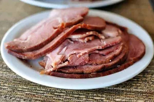 Jamón con sirope de arce y azúcar moreno en olla de cocción lenta