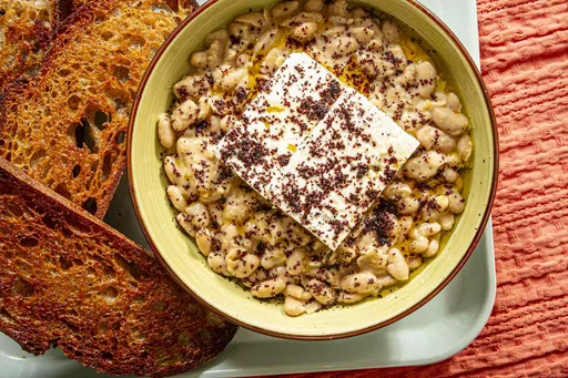Buttery Garlicky Cannellini Beans With Feta and Sumac