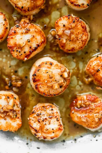 Vieiras Marcadas a la Plancha