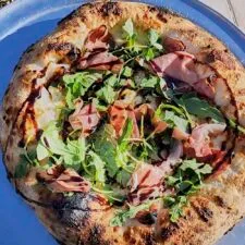 Easy Wood-Fired White Pizza with Boursin, Prosciutto & Arugula Recipe