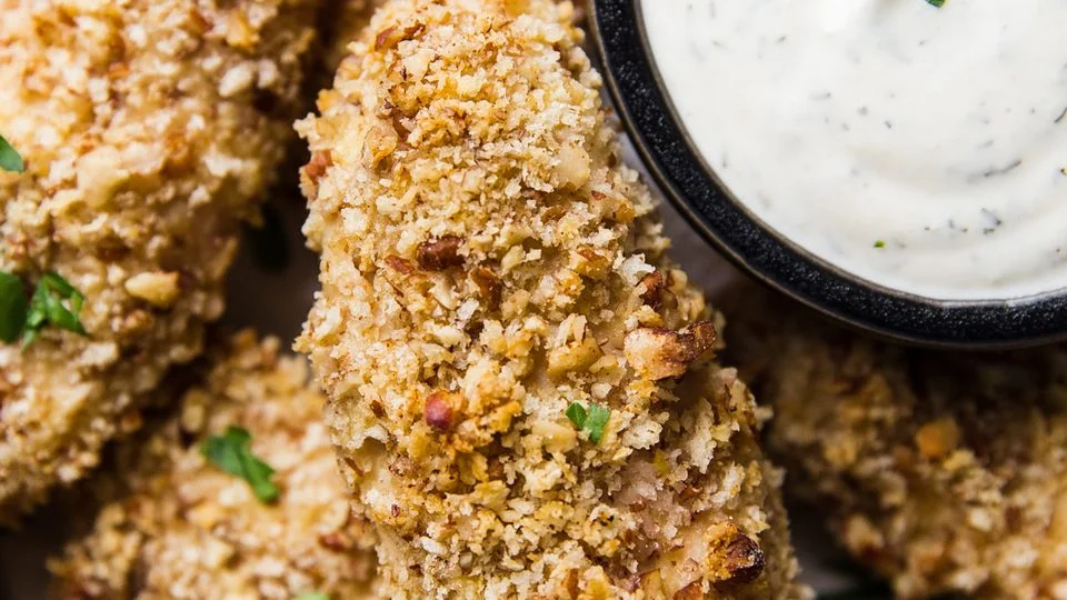 Aiguillettes de poulet aux noix de pécan au four