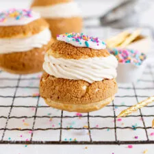 Coffee and Milk Chocolate Cream Puffs with Rose Icing