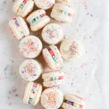 New Year's Macarons with Vanilla Bean Swiss Meringue Buttercream and Pop Rocks