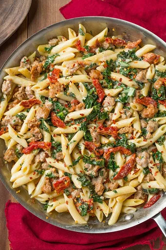 Creamy Kale and Turkey Sausage Pasta with Sun Dried Tomatoes